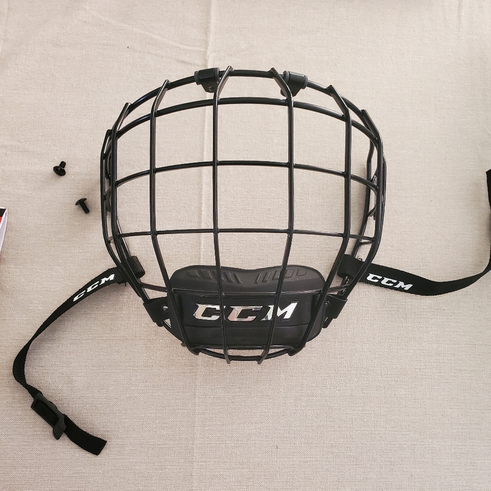 CCM helmet cage size small. Never used